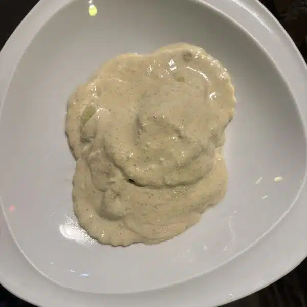 PA25. RAVIOLI RICOTTA AND SPINACH IN WALNUT SAUCE